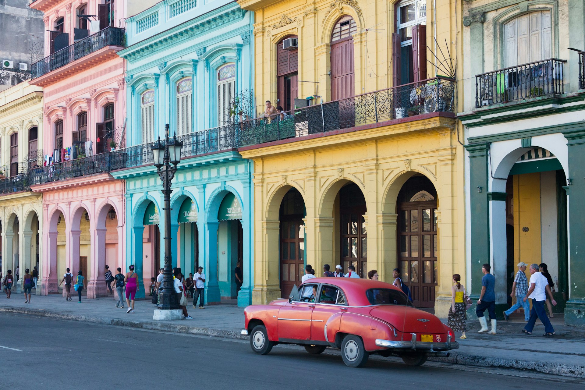 Colorful houses and an old car in Havana