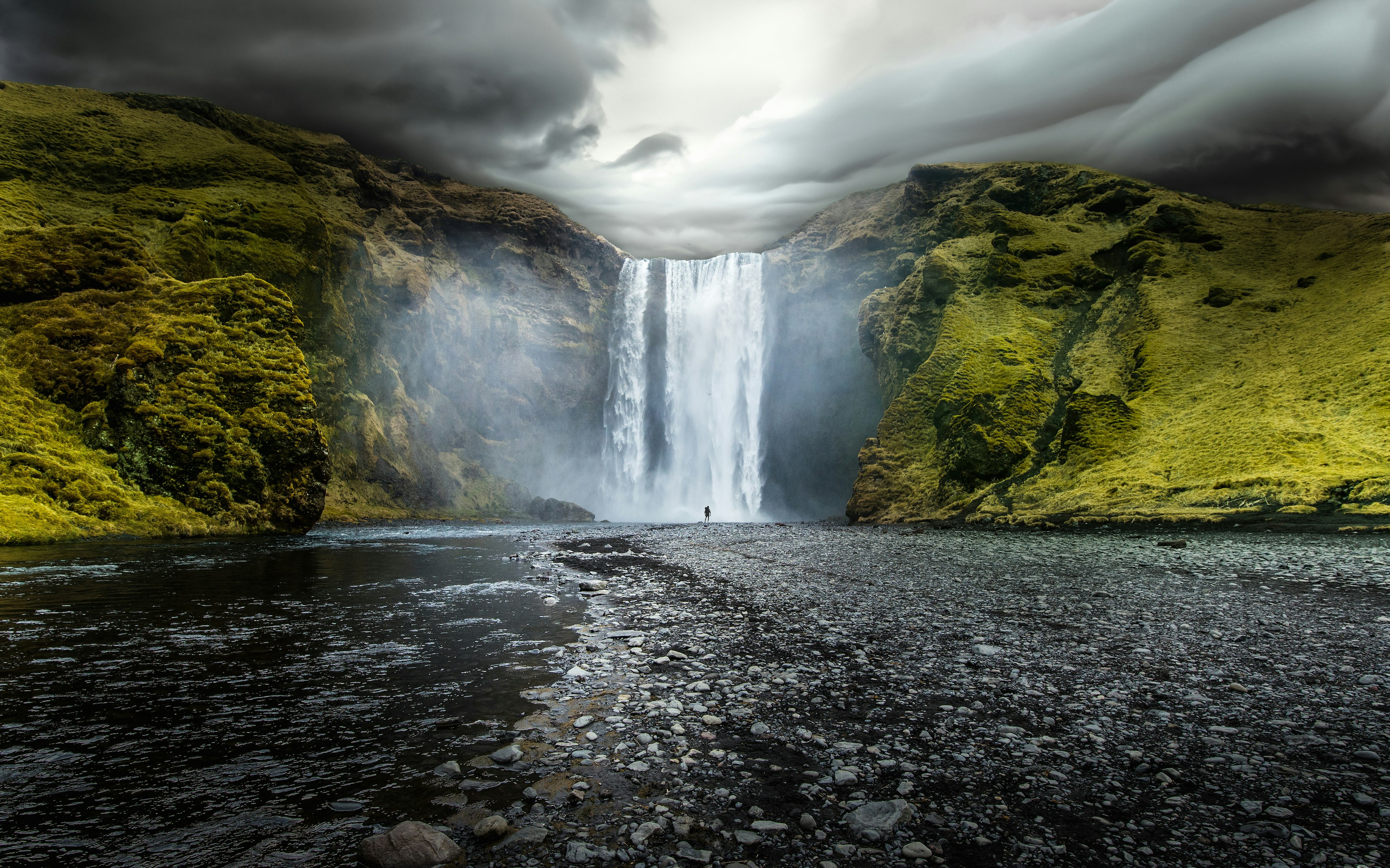 Overcast sky over waterfall, Iceland