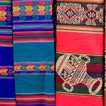 An Aguayo is a rectangular piece of cloth used in traditional communities in the Andes of Ecuador, Peru, Bolivia, Chile and Argentina. The aguayo is most associated with Quechua and Aymara culture but is not exclusive to them. Aguayos typically features colorful stripes intercalated with rhombuses and other figures with symbolic values.