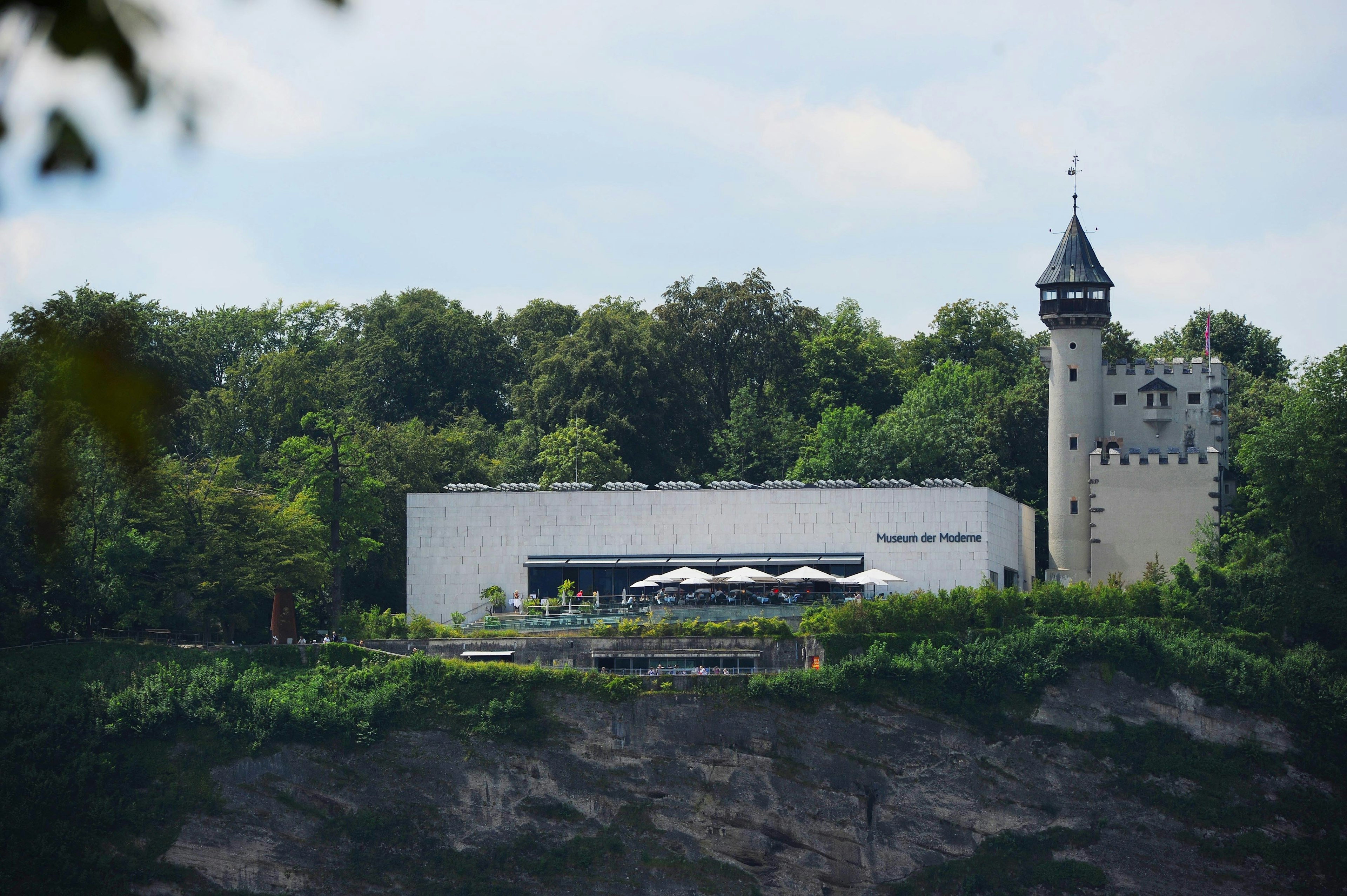 Salzburg Museum of Modern Art (L) and the historical water tower are pictured on July 29, 2011 in Salzburg, Austria.