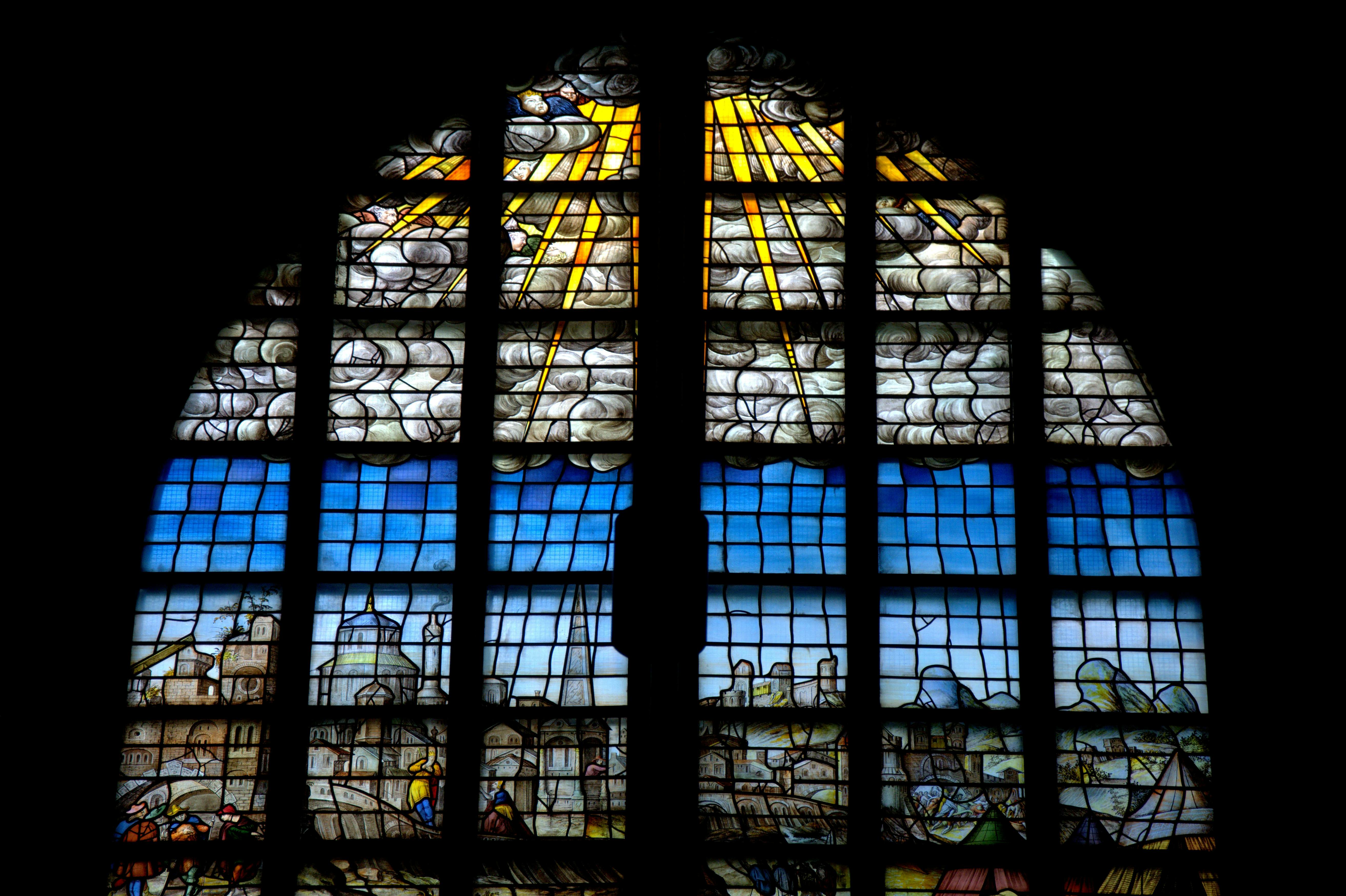 The famous stained glass windows of Sint Janskerk ( saint John Church )of Gouda abound in political symbolism, reproducing figures and events of the time, and use biblical events to refer to the conflict between Spanish Catholics and Dutch Protestants that led to the Dutch Uprising of 1572.