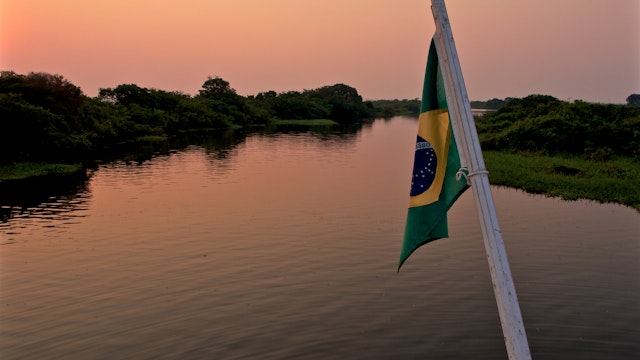 In this photo is possible to see a boat in the Anavilhanas Archipelago region.The river is the principal path of transportation for people and produce in the Amazon regions, with transport ranging from balsa rafts and dugout canoes to hand built wooden river craft and modern steel hulled craft.