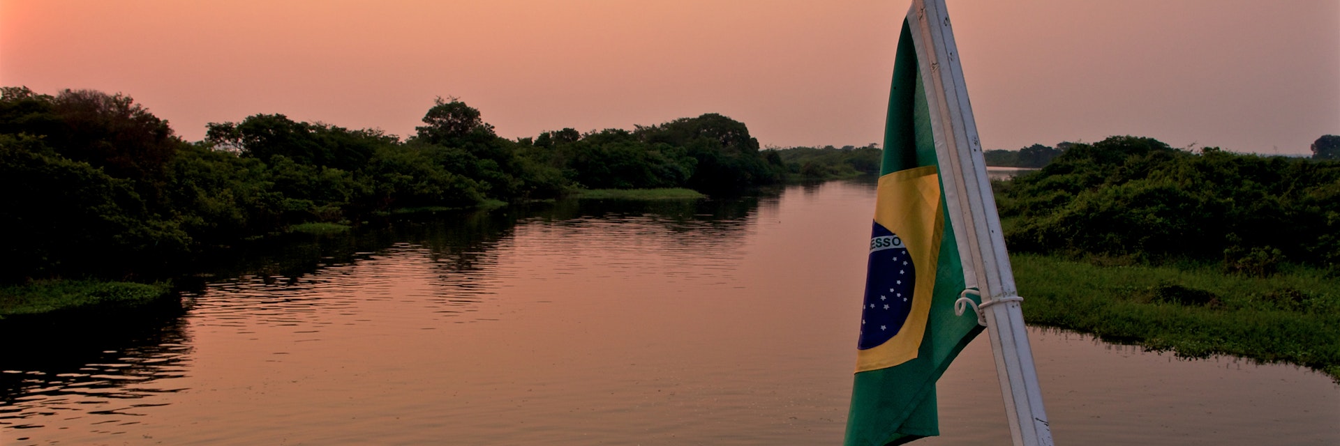 In this photo is possible to see a boat in the Anavilhanas Archipelago region.The river is the principal path of transportation for people and produce in the Amazon regions, with transport ranging from balsa rafts and dugout canoes to hand built wooden river craft and modern steel hulled craft.