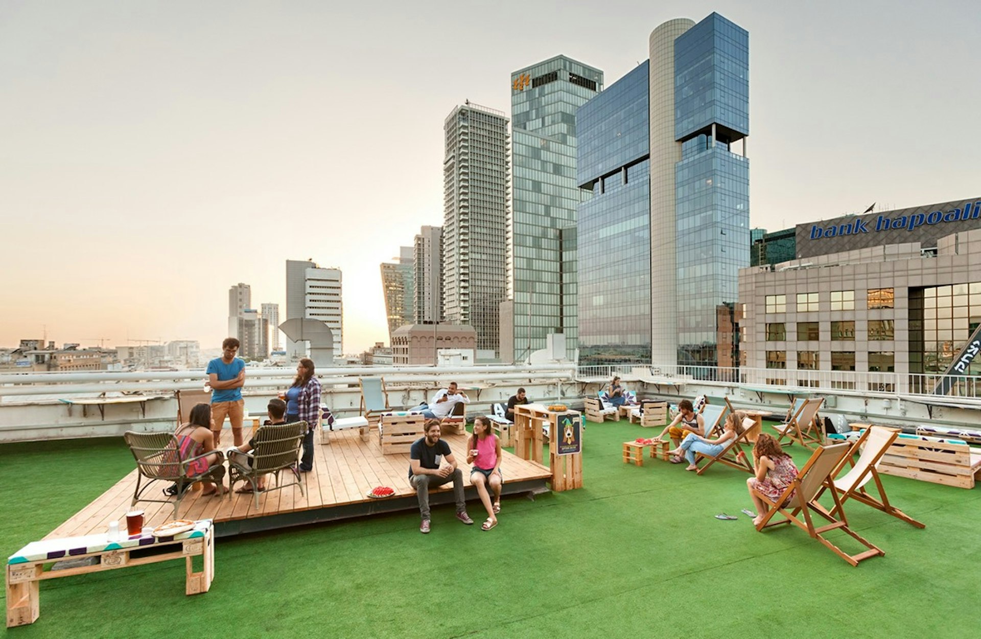 Backpackers in a roof garden at Abraham Hostels