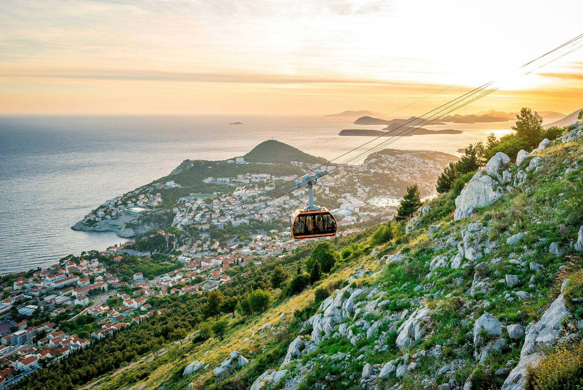 The Dubrovnik cable car descends Srd hill during sunset