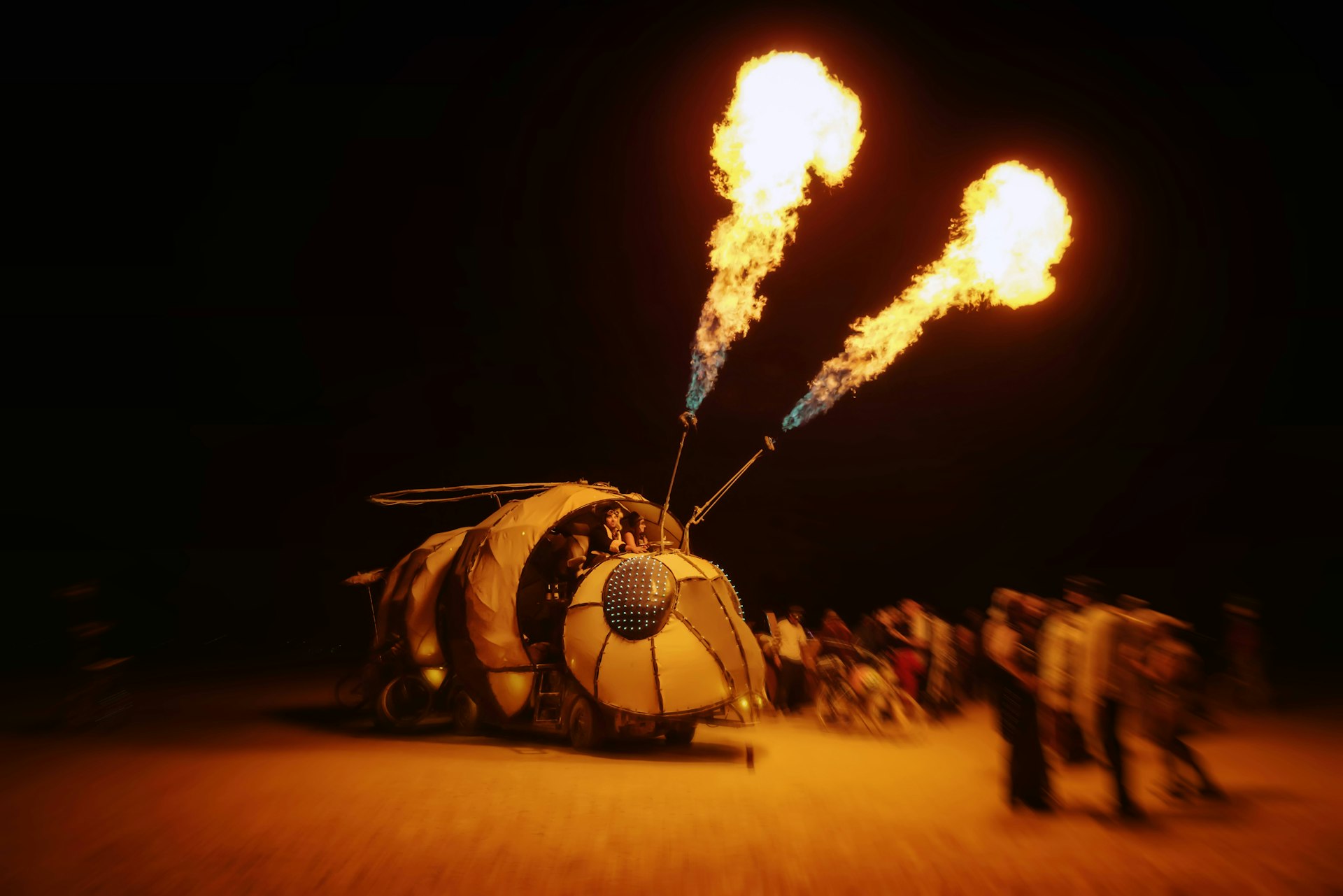 Flames shooting from a mutant vehicle at Burning Man 
