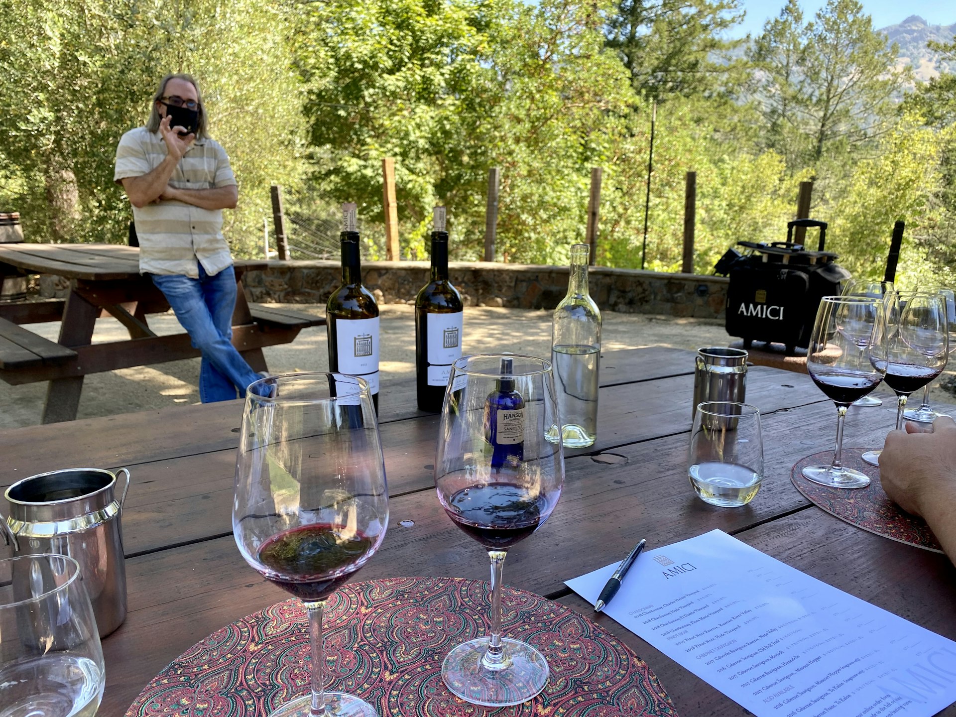 Masks and social distancing are part of the wine tasting experience at California wineries