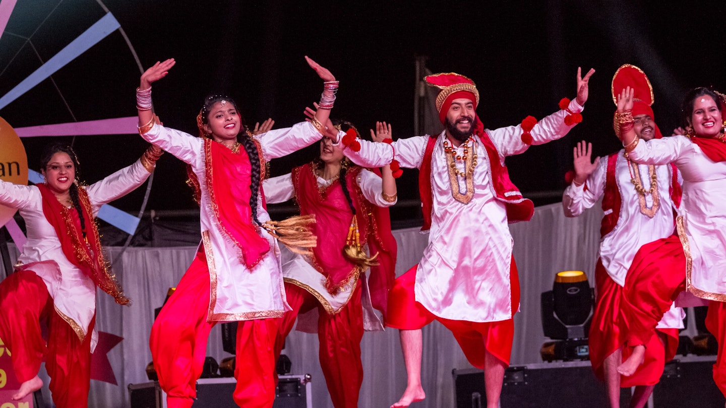 Artist Performing Bhangra Dance : Bikaner, Rajasthan/India - Jan 2019; Shutterstock ID 1368920021; Your name (First / Last): William Broich; GL account no.: 65050; Netsuite department name: Editorial ; Full Product or Project name including edition: 65050/Online Editorial/Alicia Johnson/best dances from around the world you can do at home