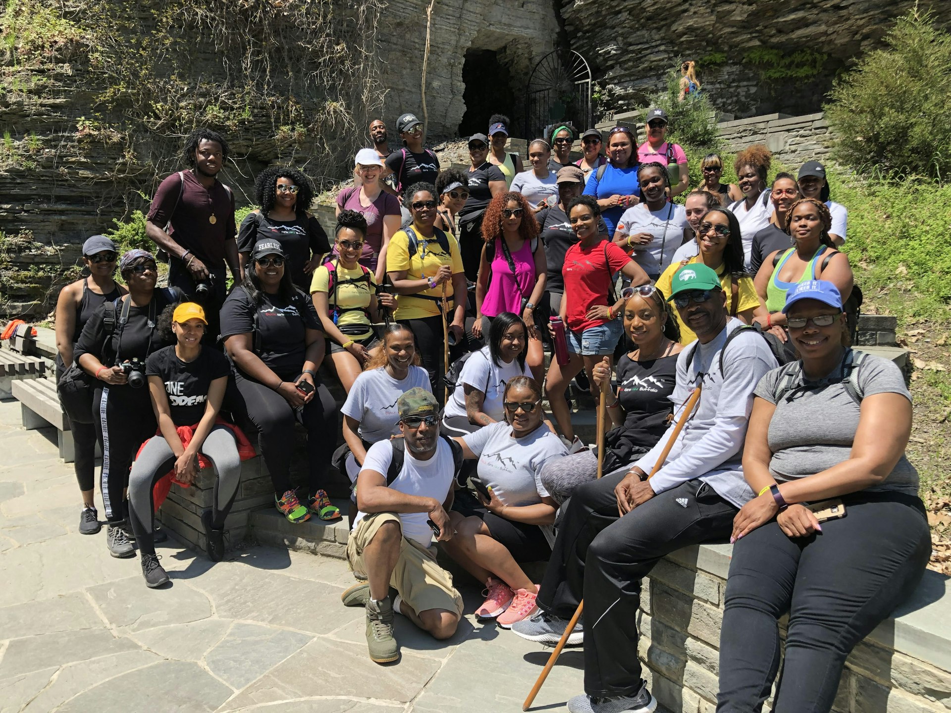 A group of Black hikers pose for a camera as part of Black Girls Hike Buffalo 