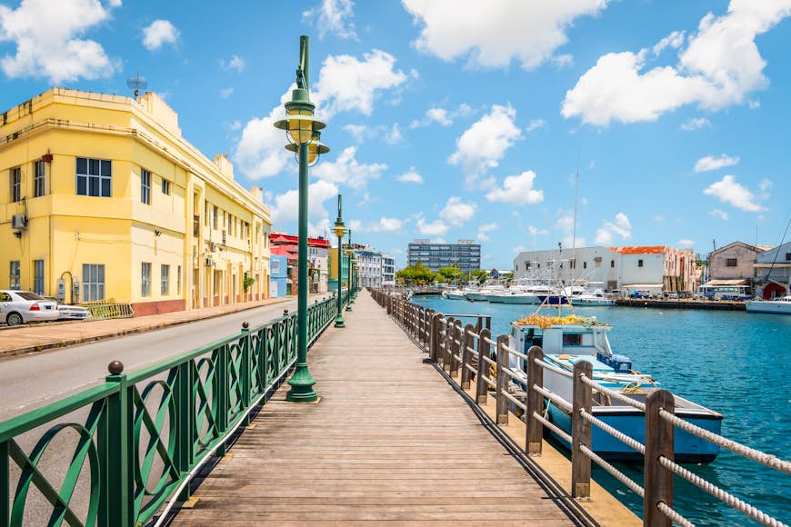 Bright image of wooden promenade at the waterfront of Bridgetown in Barbado