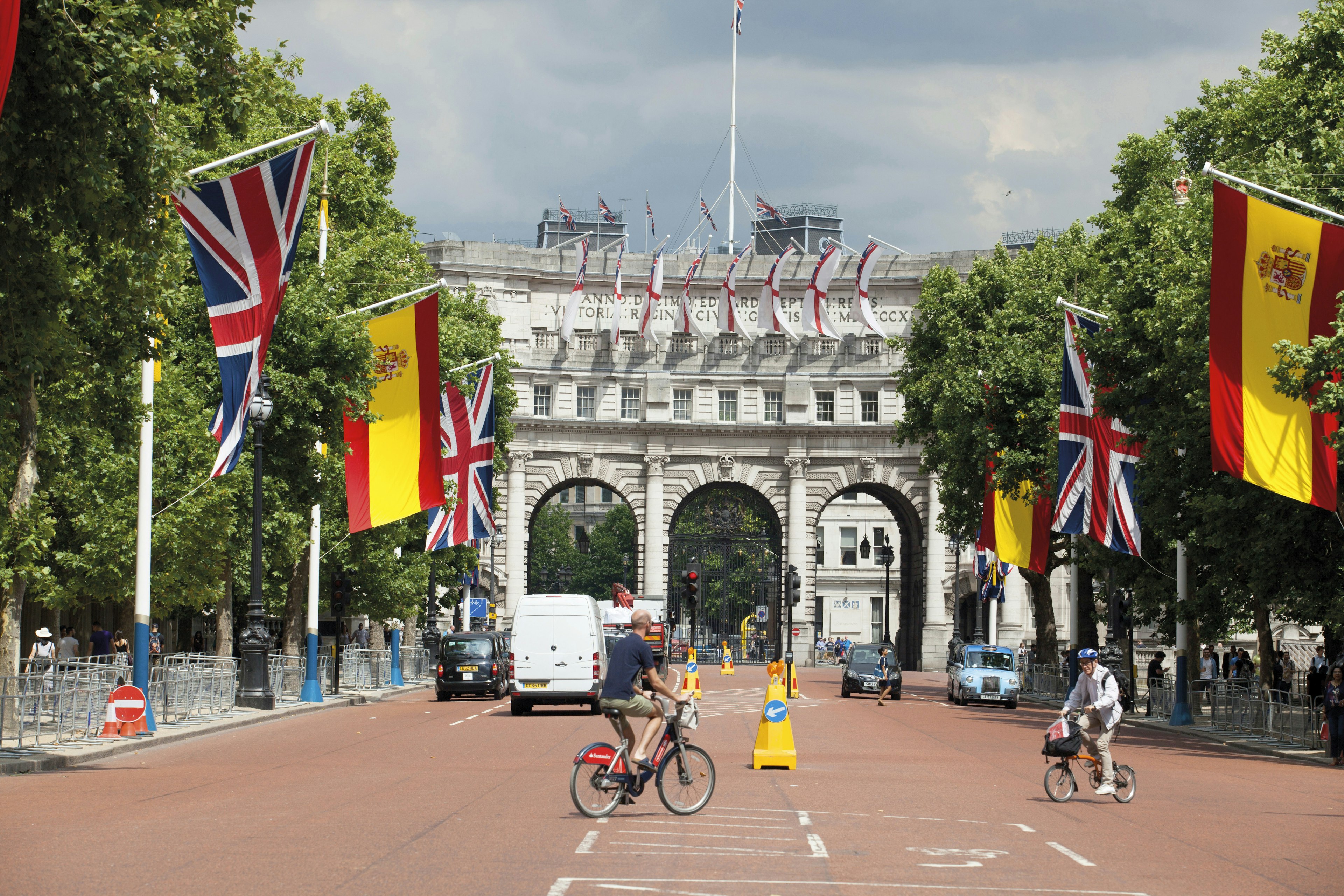 Flags are suspended near Admiralty Arch, looking toward Trafalgar Square.