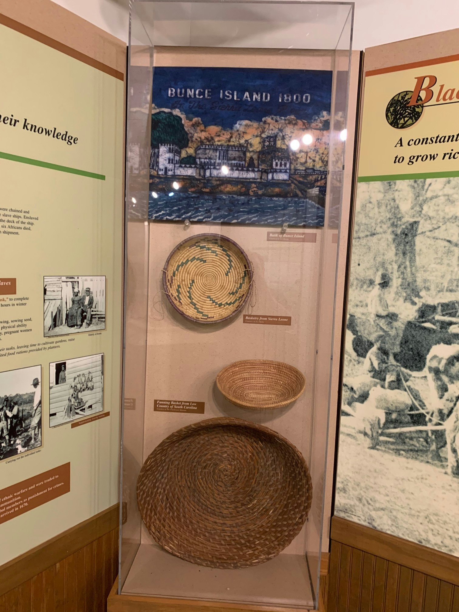 Closeup of an exhibit highlighting Gullah woven baskets at the Caw Caw Interpretive Center