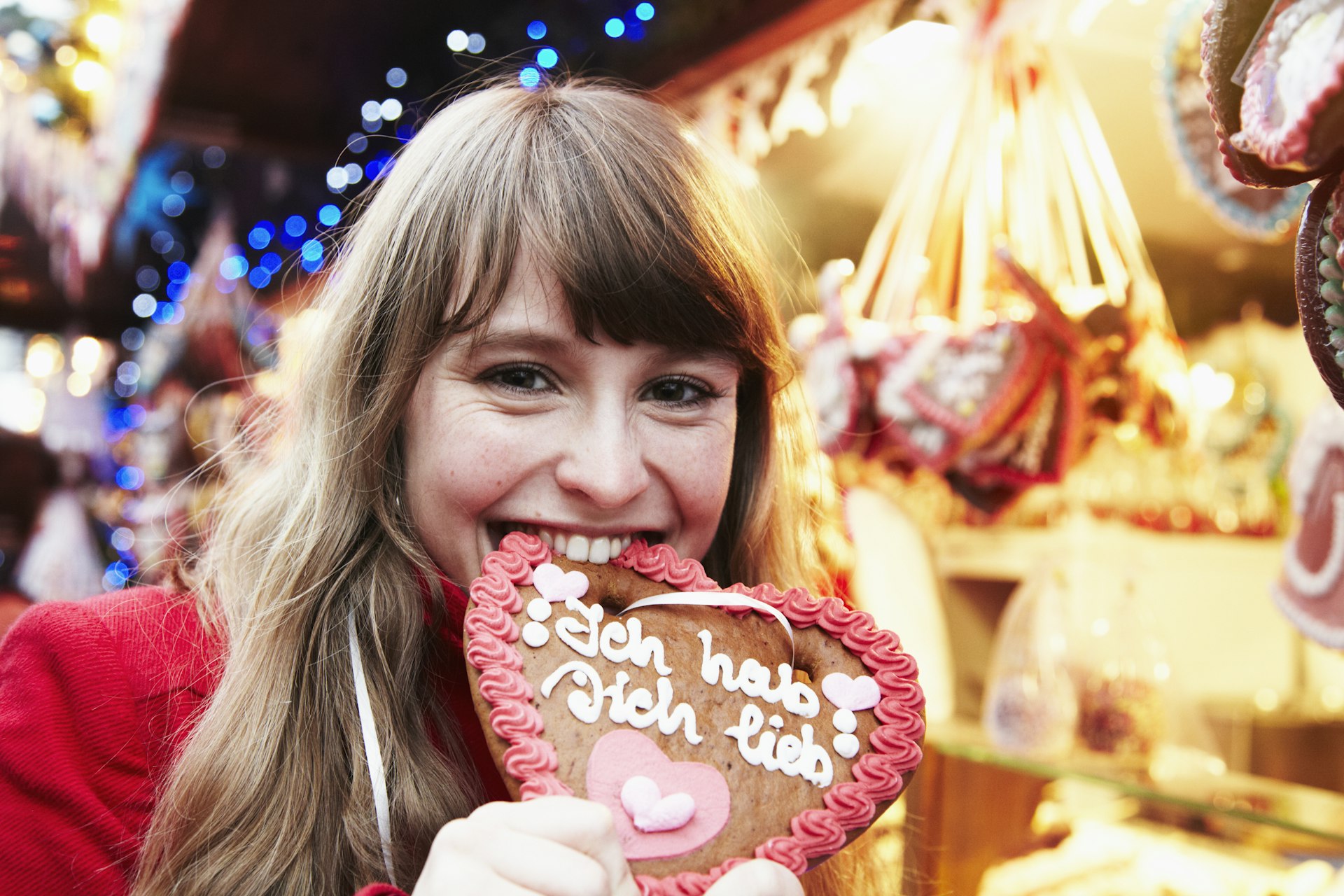 young adult woman having fun on a christmas market