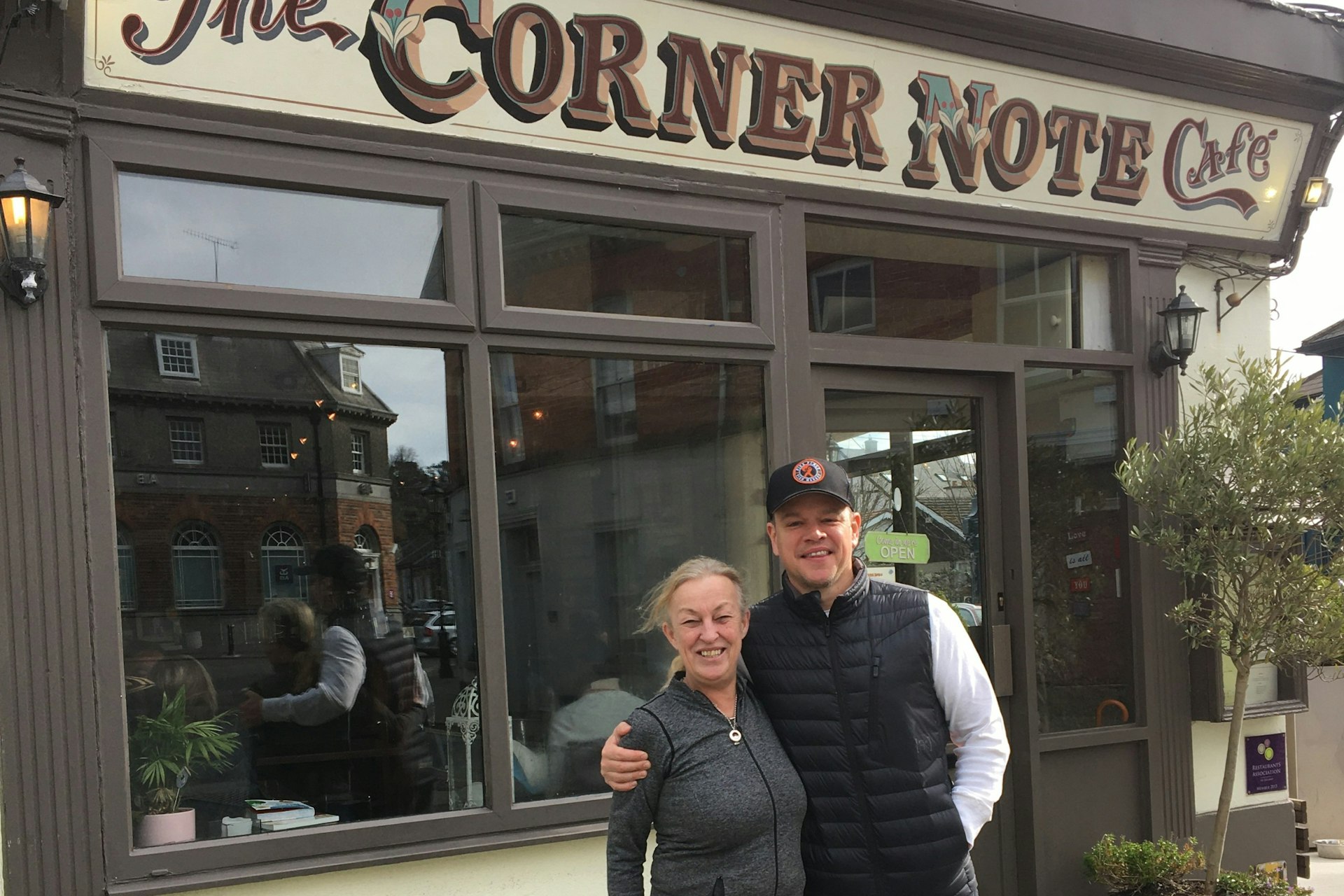 Matt Damon with Mary Caviston, owner of The Corner Note Café