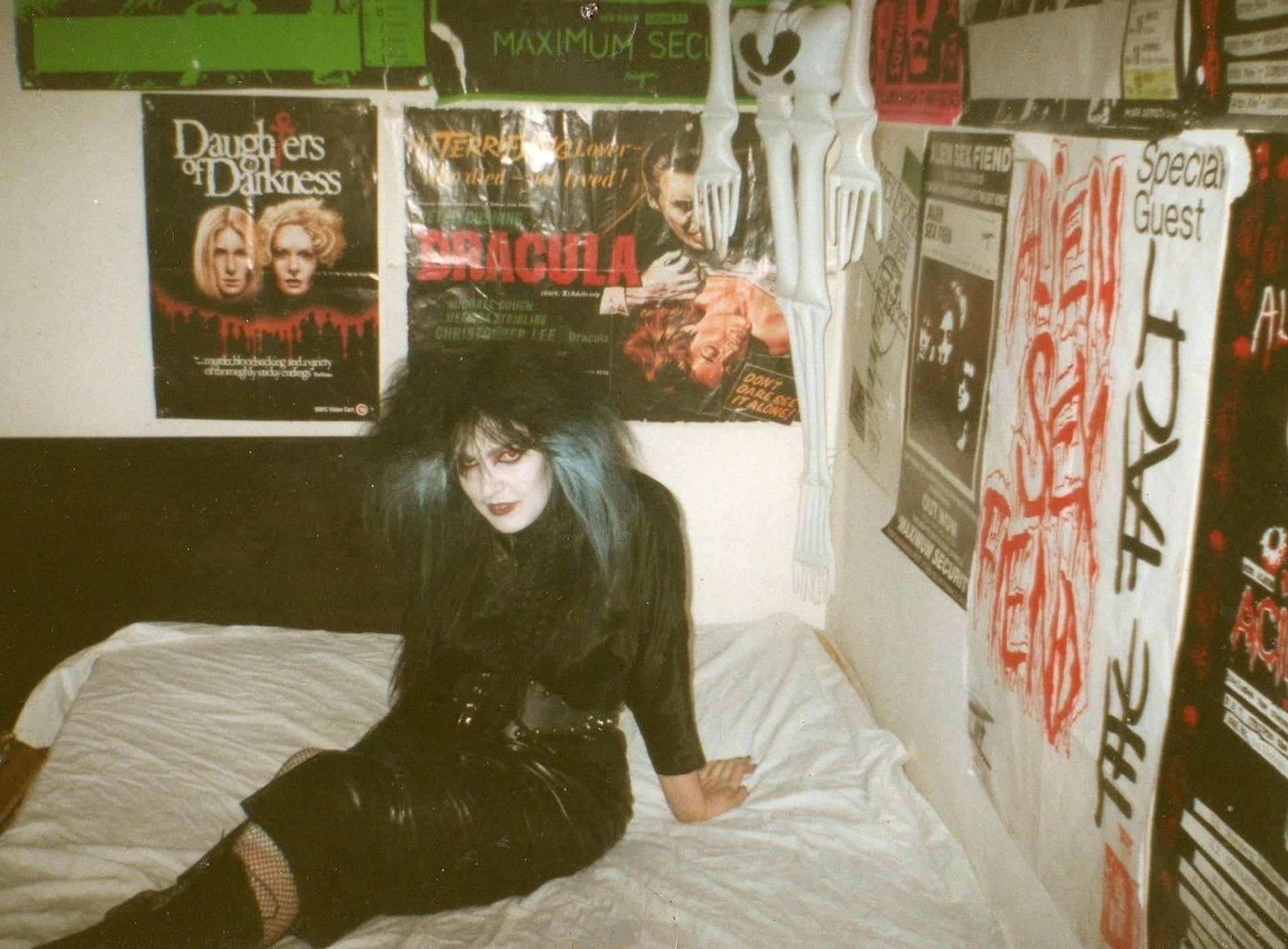 A picture of a teenage goth girl inside her bedroom