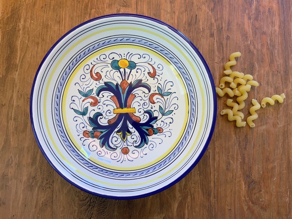 Deruta Ricco Pasta Bowl with dried pasta on a table