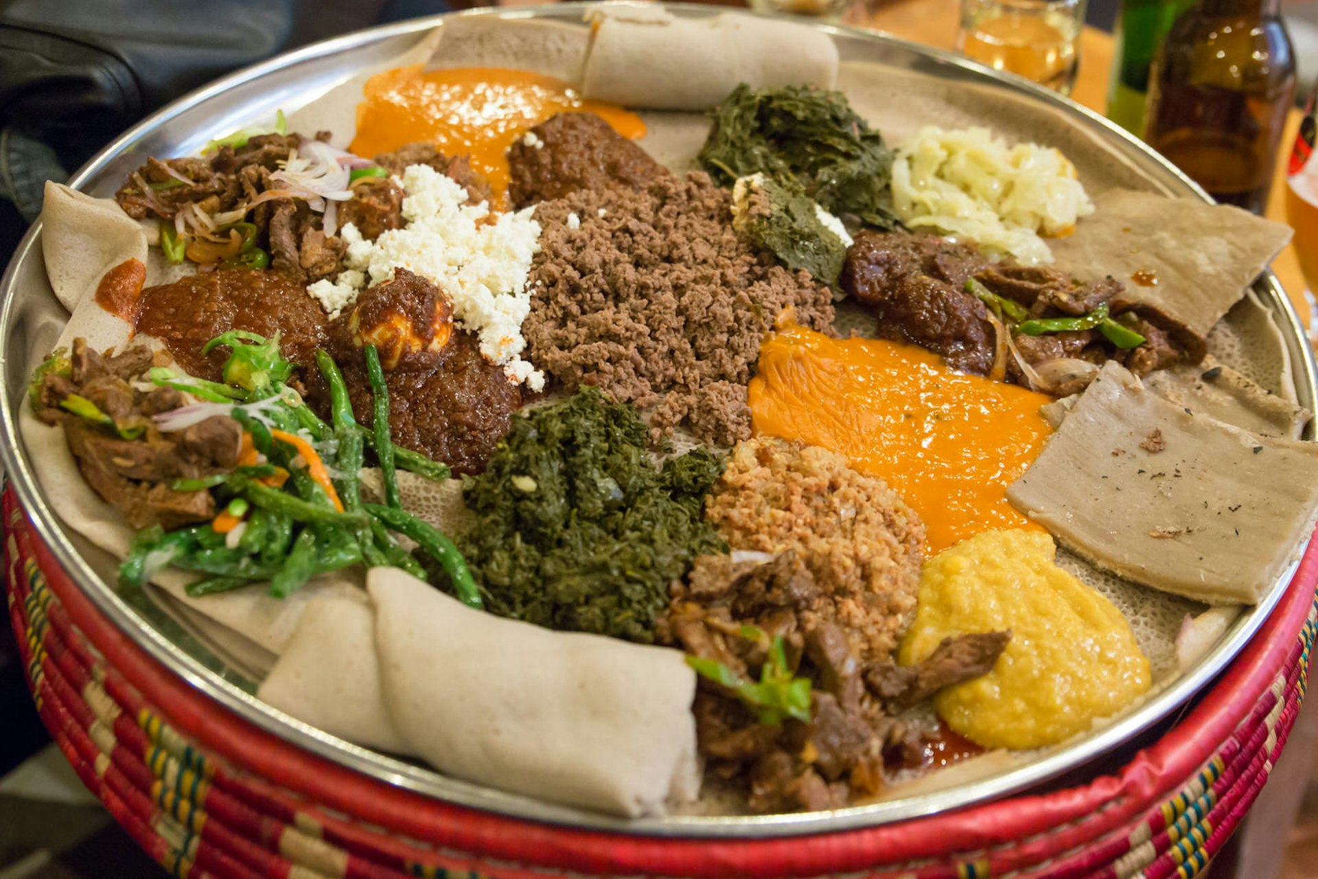 Closeup of injera be wot, traditional Ethiopian food platter