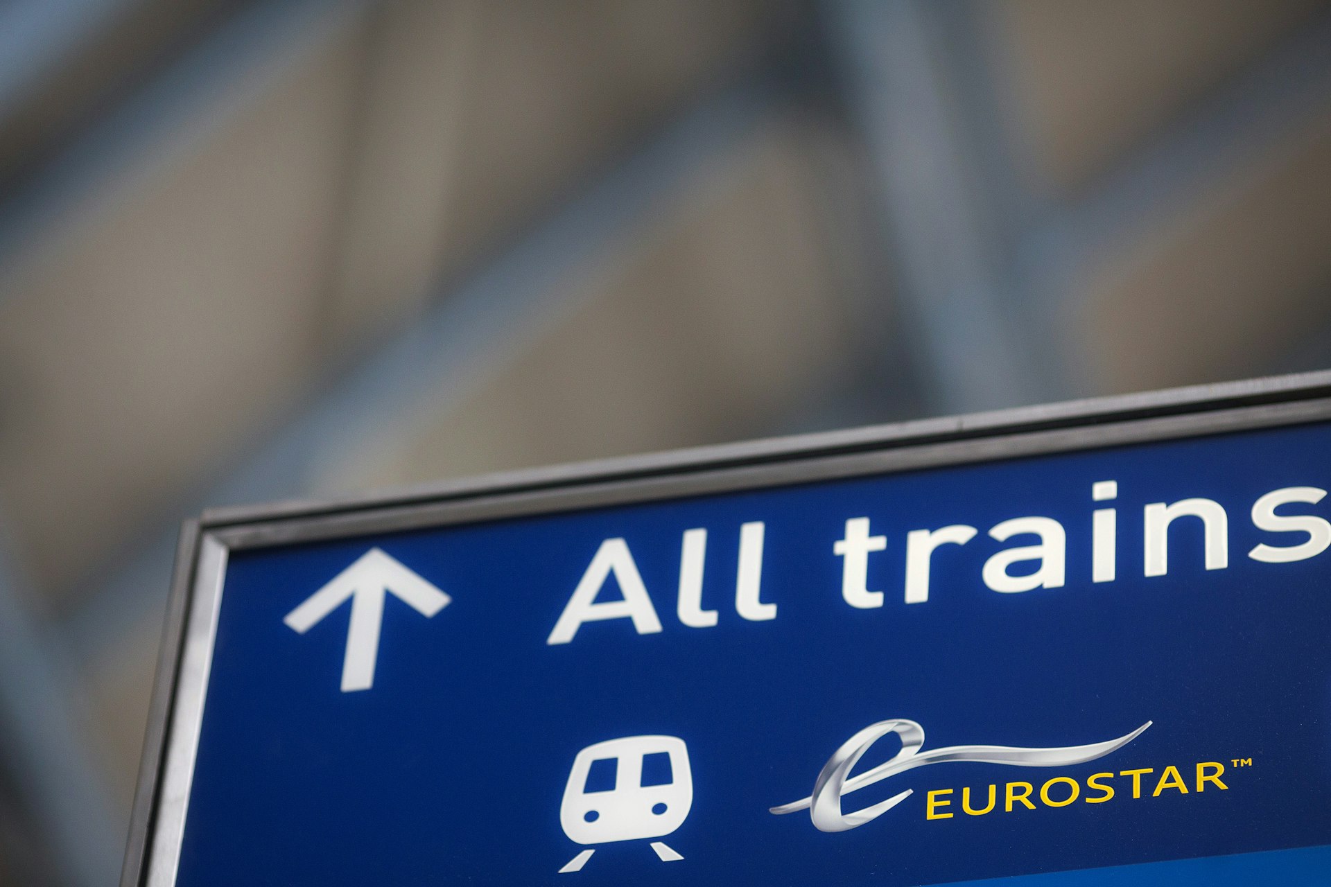 A sign directs Eurostar International Ltd. passengers towards boarding platform
