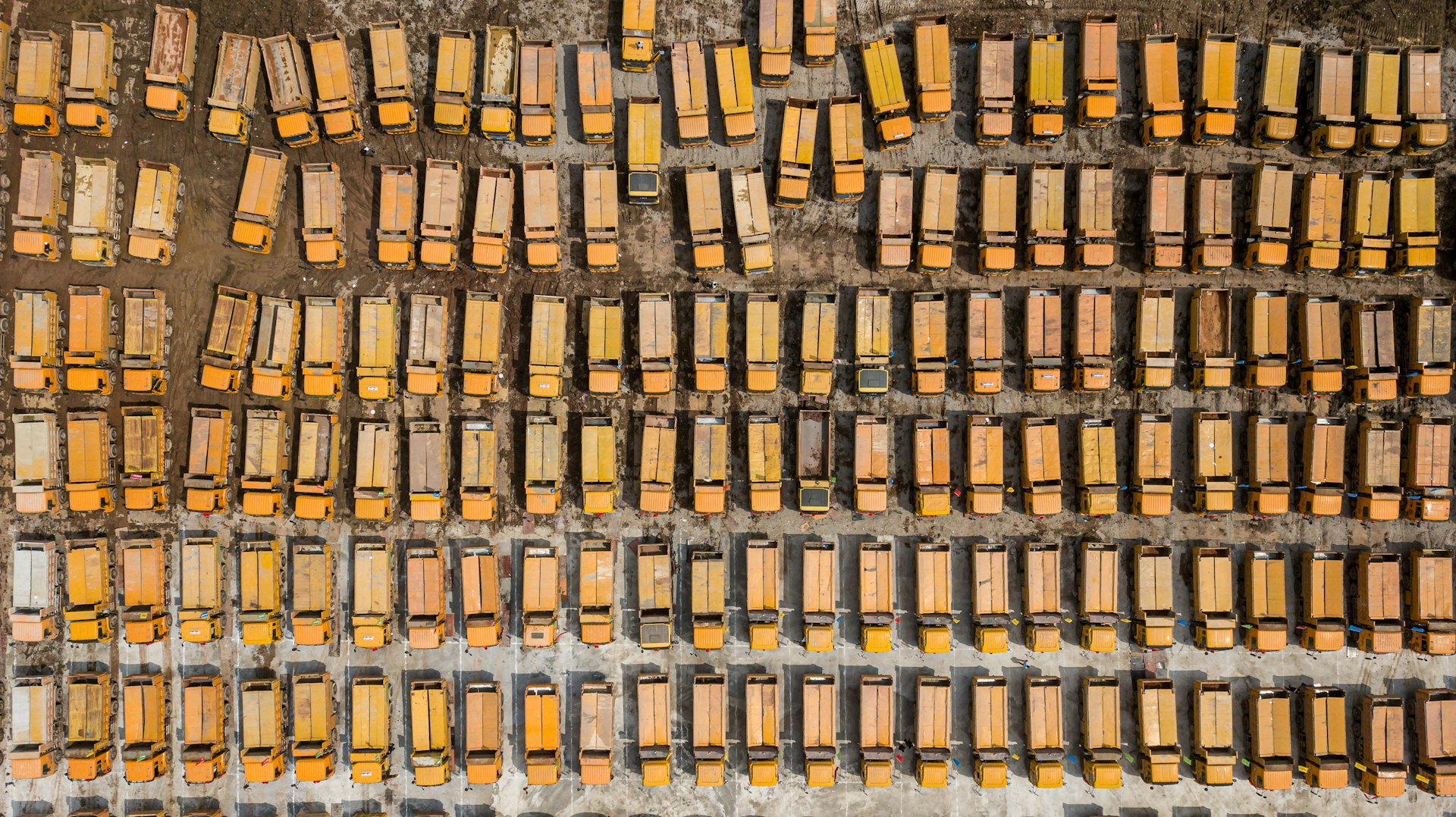 This aerial photo shows trucks gathered at the ground-breaking ceremony of Guangzhou Evergrande's new stadium in Guangzhou