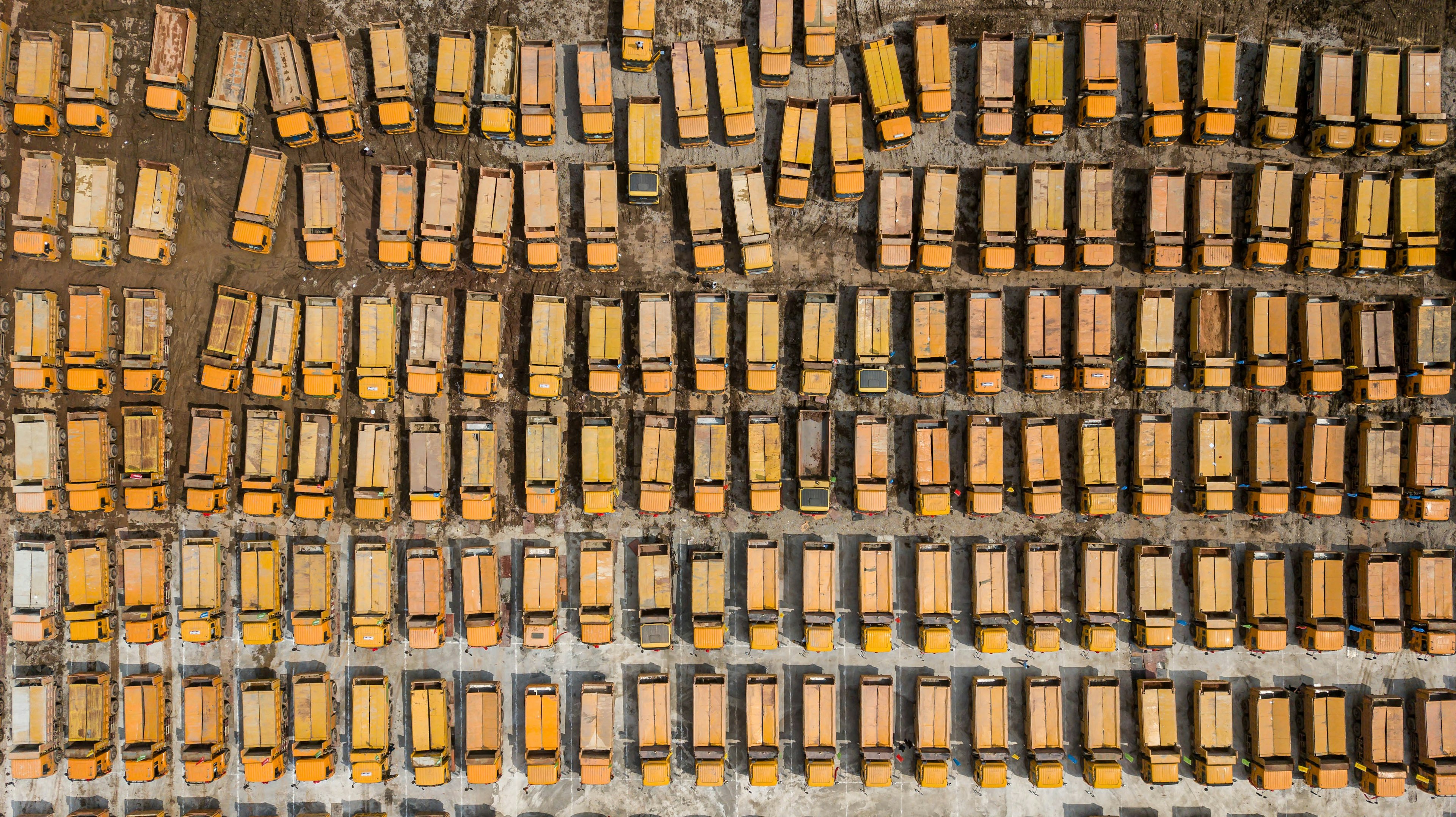 This aerial photo shows trucks gathered at the ground-breaking ceremony of Guangzhou Evergrande's new stadium in Guangzhou