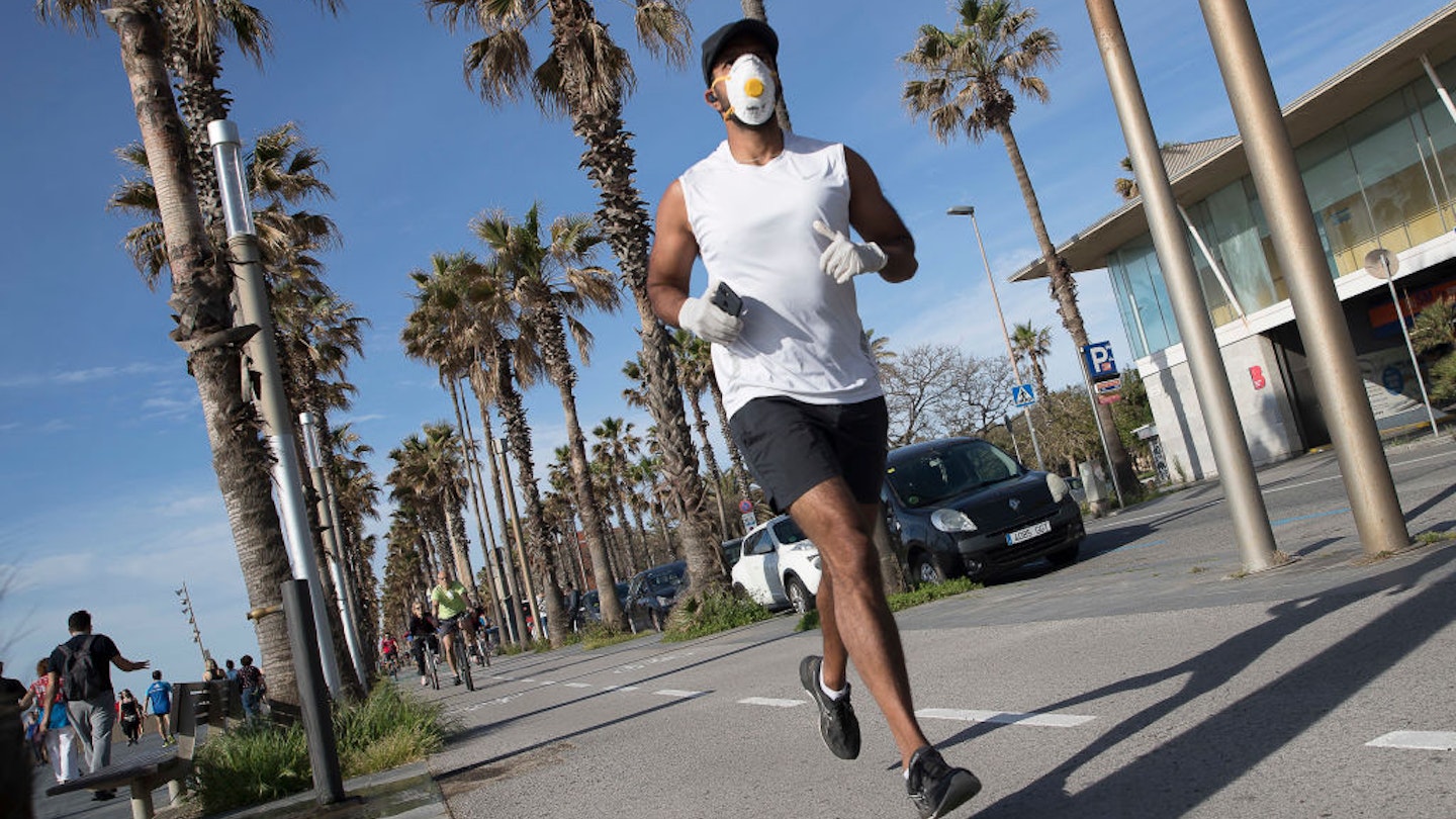 Thousands of people run along the seafront of Barcelona after releasing the practice of sport in the midst of the Coronavirus-COVID19 crisis in Barcelona, Catalonia, Spain on May 2, 2020. (Photo by Albert Llop/NurPhoto via Getty Images)