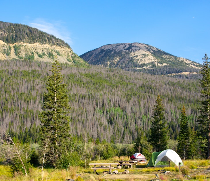 A beautiful camping spot at Timber Creek campground in Rocky Mountain national park in Colorado. A perfect blue sky, beetle kill all over the mountain sides, and a feeling of peace and quiet you can only achieve camping.