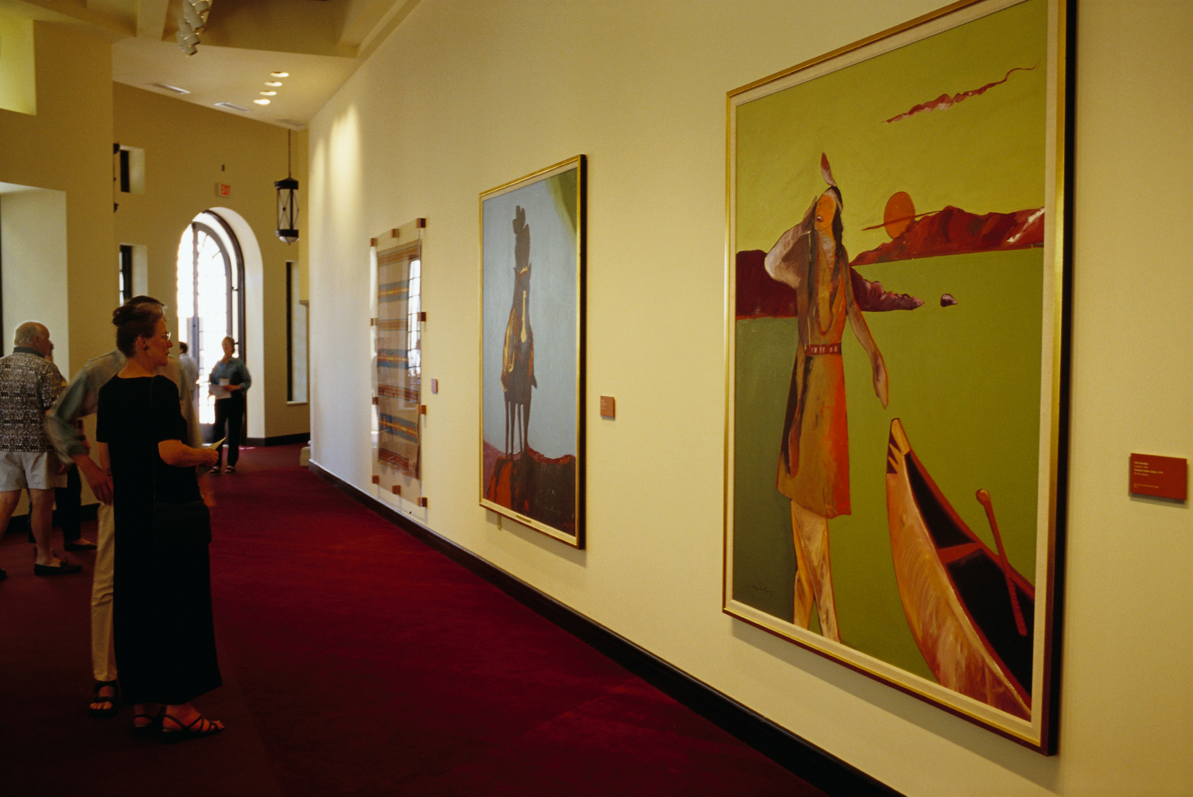 Visitors at the Heard Museum View Paintings by Fritz Scholder