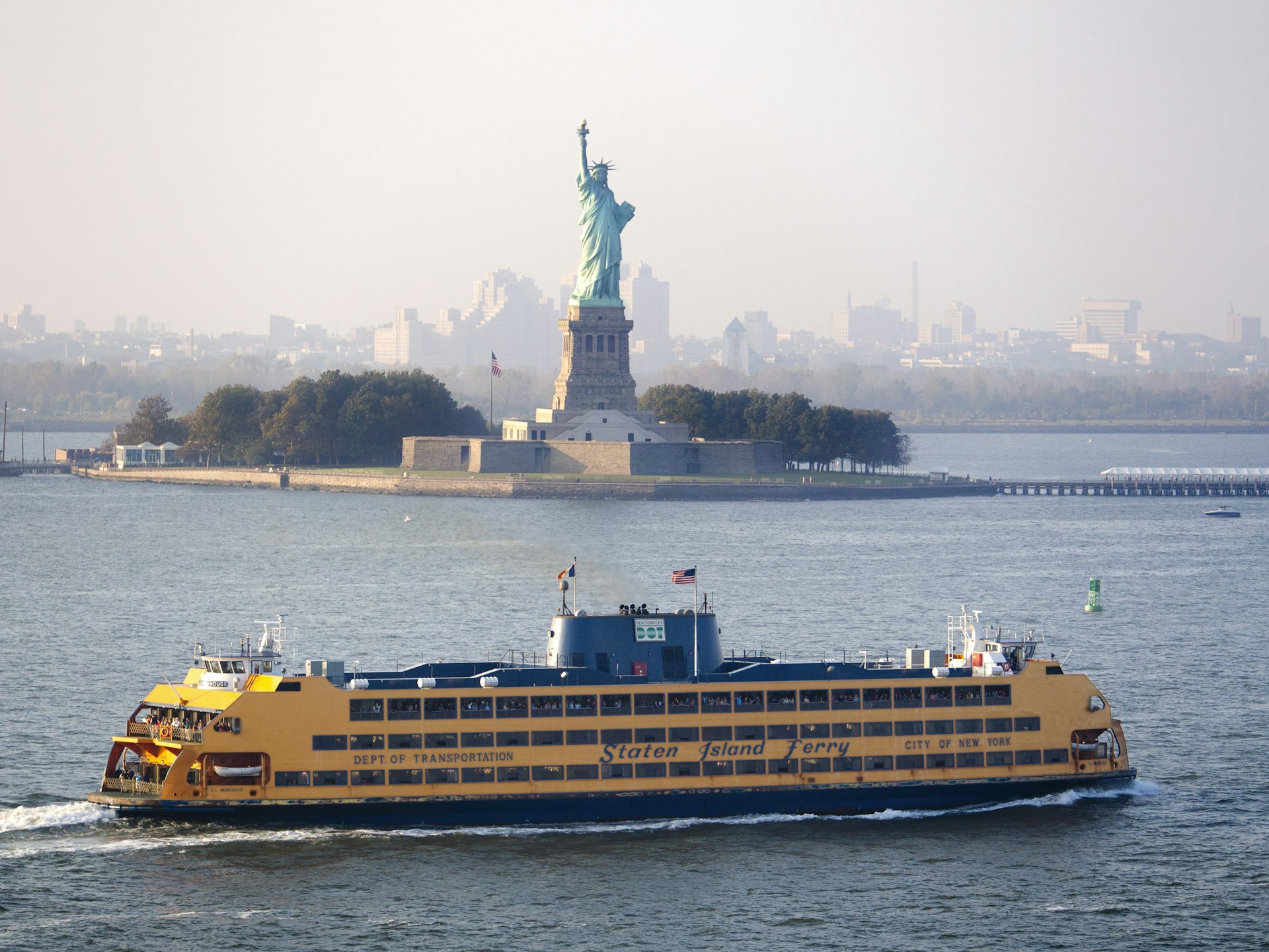 Ferry passing the Statue of Liberty