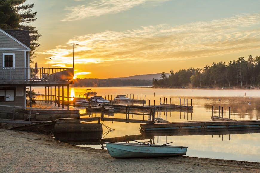 Boats on the shore at sunset at Lake Sunapee, New Hampshire
