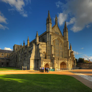 Sun shining on the exterior of Winchester Cathedral.