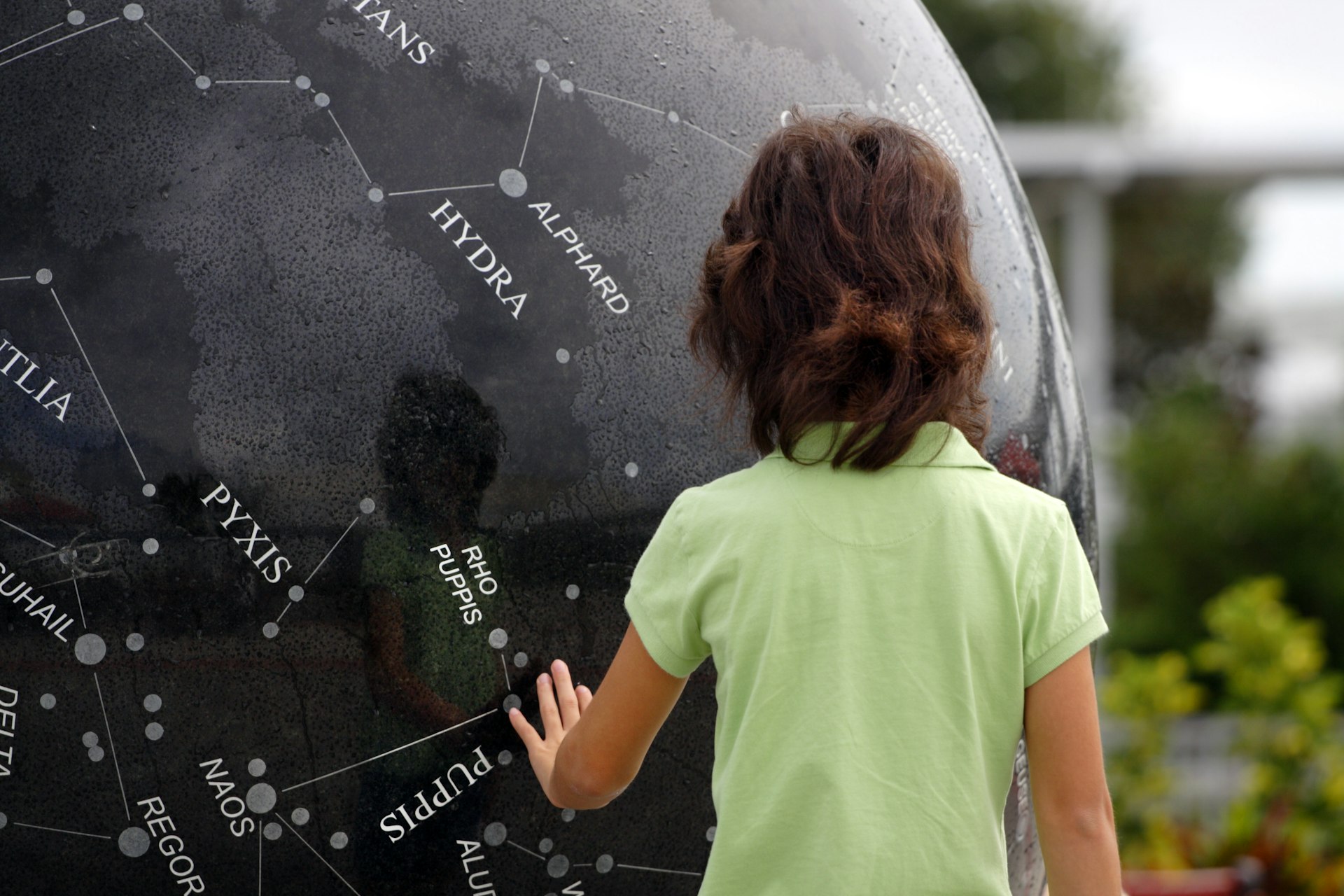 Young child looking at constellations