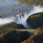 Panoramic view of Victoria Falls and the old bridge