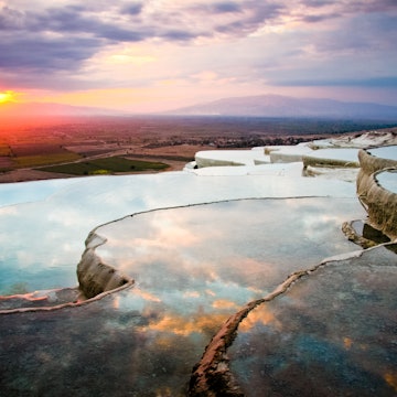 Layers of travertines form terraces of carbonate minerals in Pamukkale, Southwest Turkey.