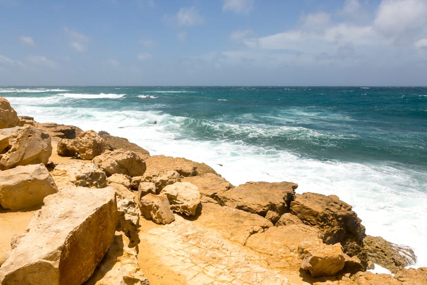 Rocky rugged limestone cliff off Atlantic coastline at Half Moon Bay