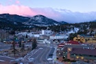 An overlook view of downtown Estes Park, Colorado a sunrise.