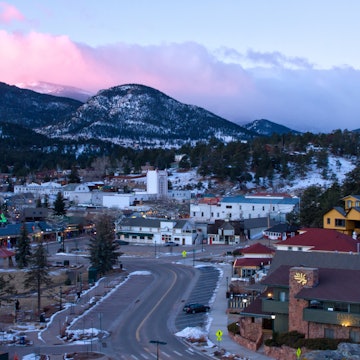 An overlook view of downtown Estes Park, Colorado a sunrise.
