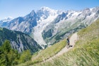 Woman mountain biking in the Aosta Valley.
