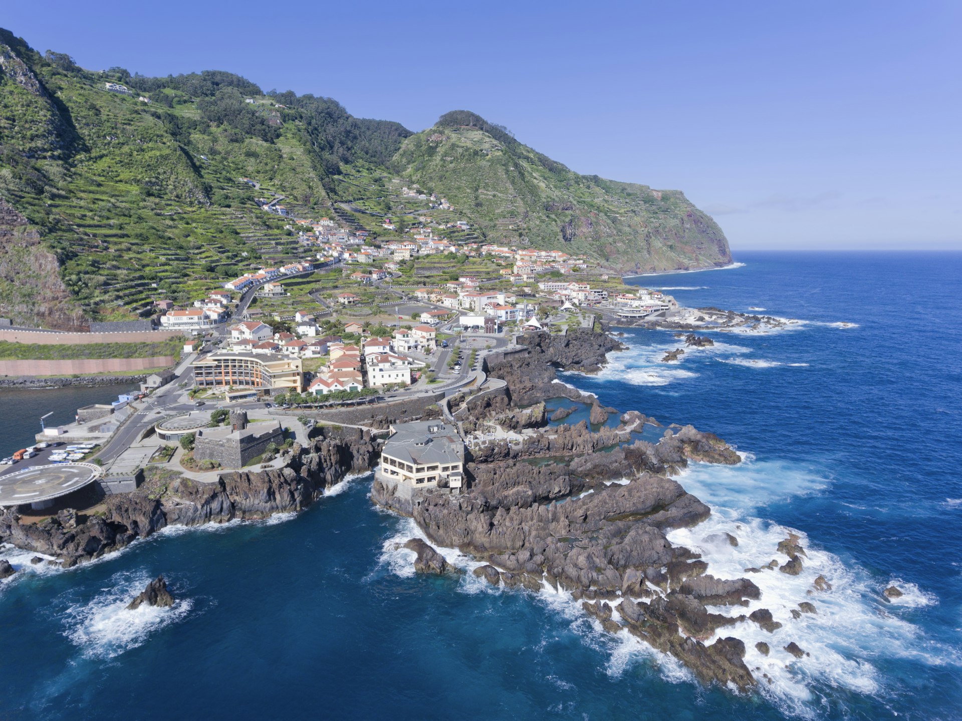 Aerial view of Porto Moniz seaside tourist town, Madeira island, Portugal .
