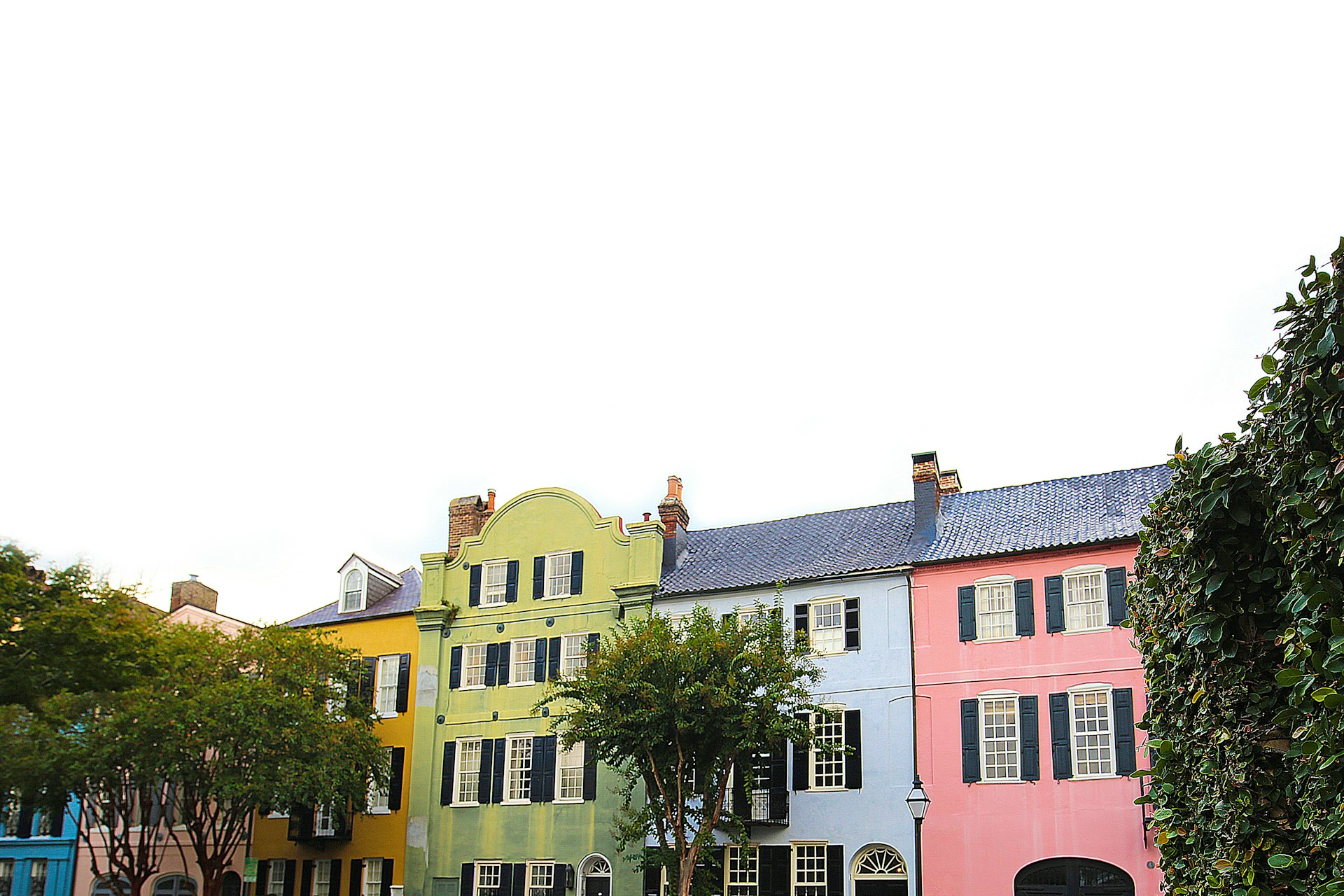 Colorful facades of rainbow row homes in Charleston