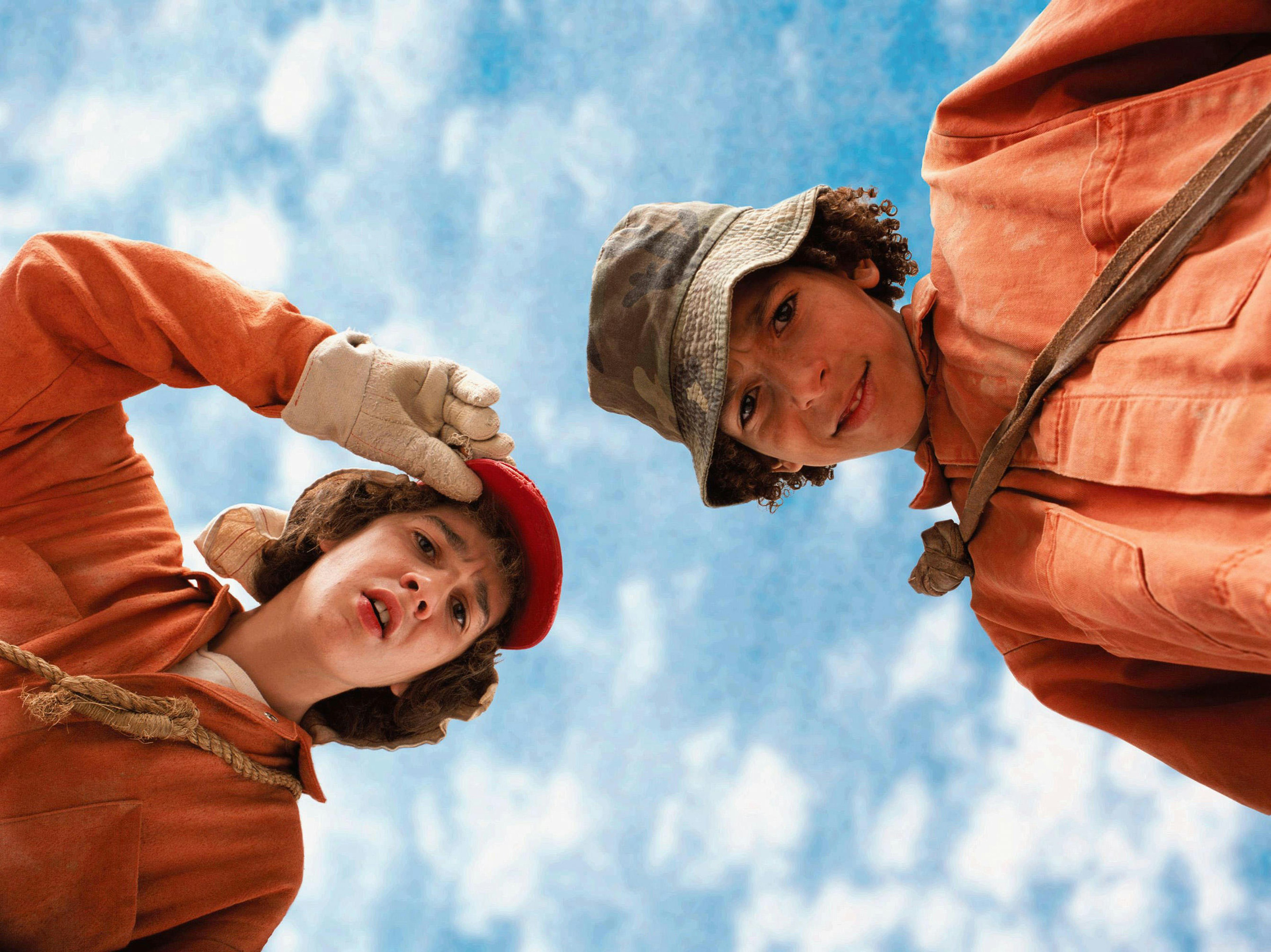 A scene from the film Holes where two actors are looking down towards the camera