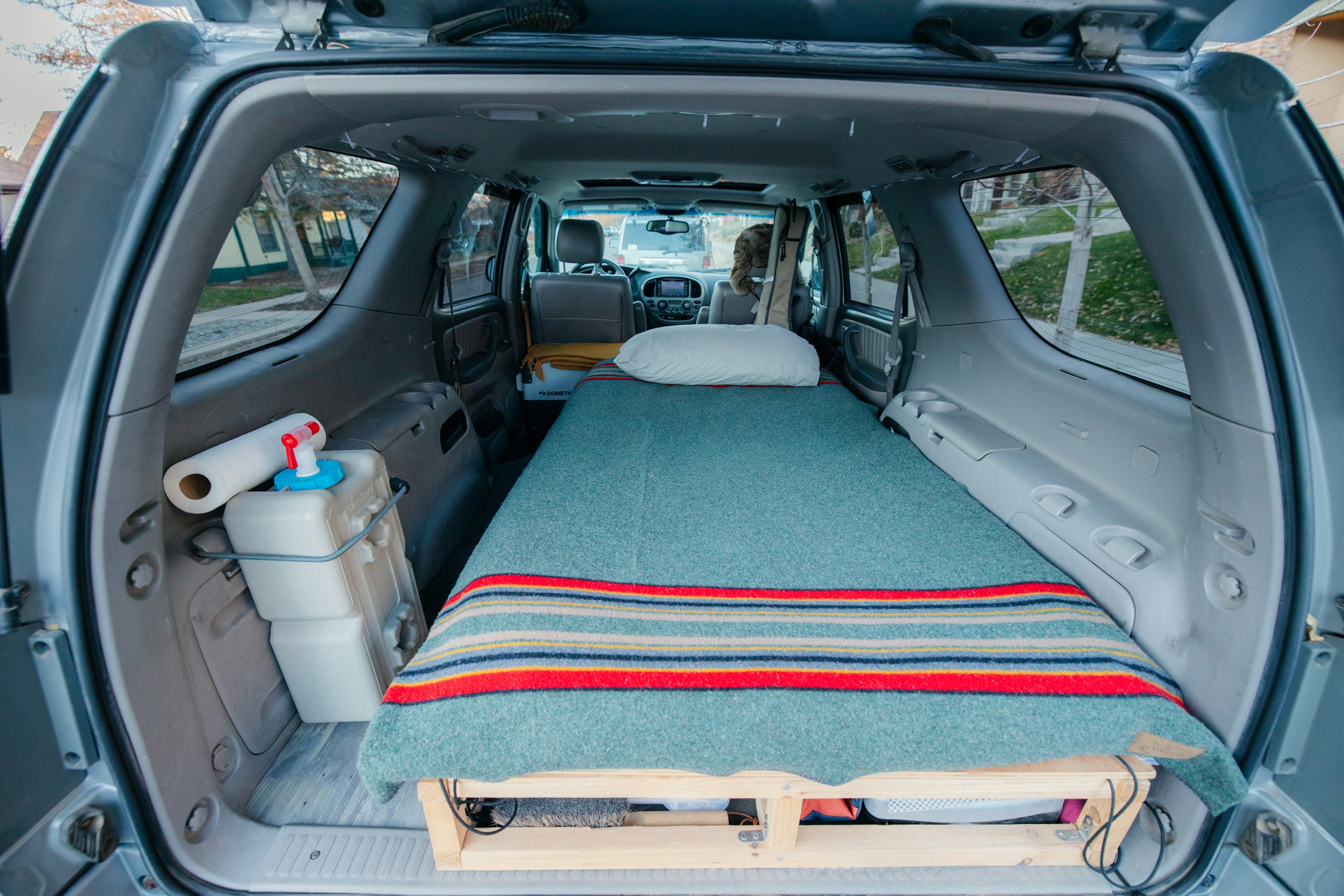 Sleeping setup and storage in Nathaniel's SUV