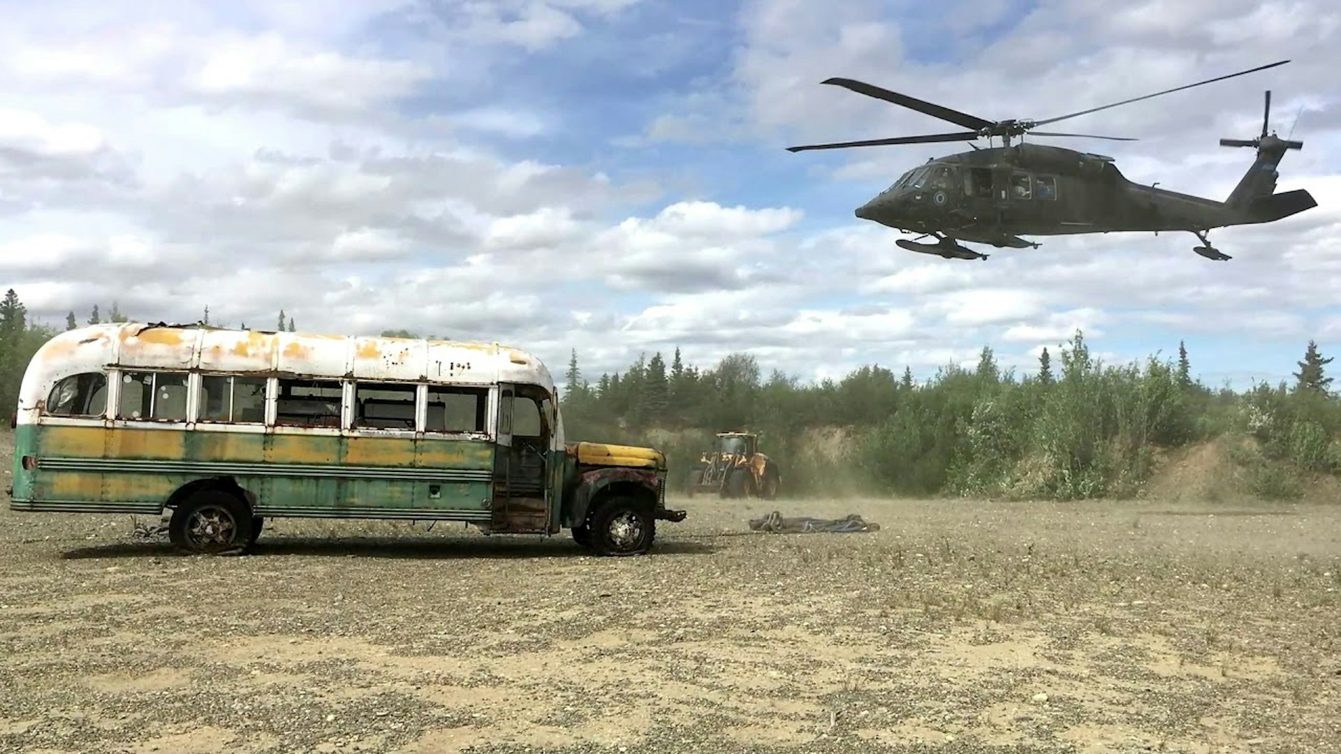 A helicopter poised to take the Into the Wild Bus away