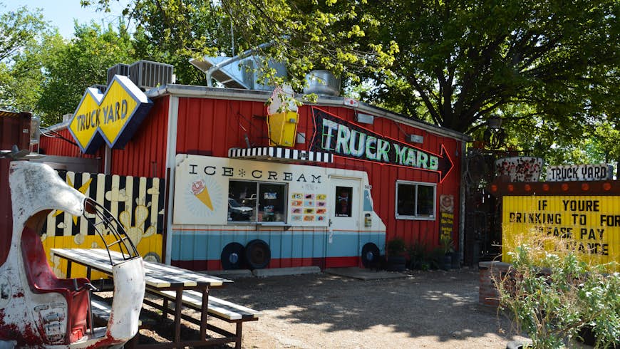 The Truck Yard in the Dallas Lower Greenville neighborhood serves ice cream in the summer in addition to having food trucks and live music in the back