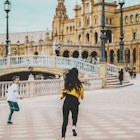 tourists kids running in España square,Sevilla