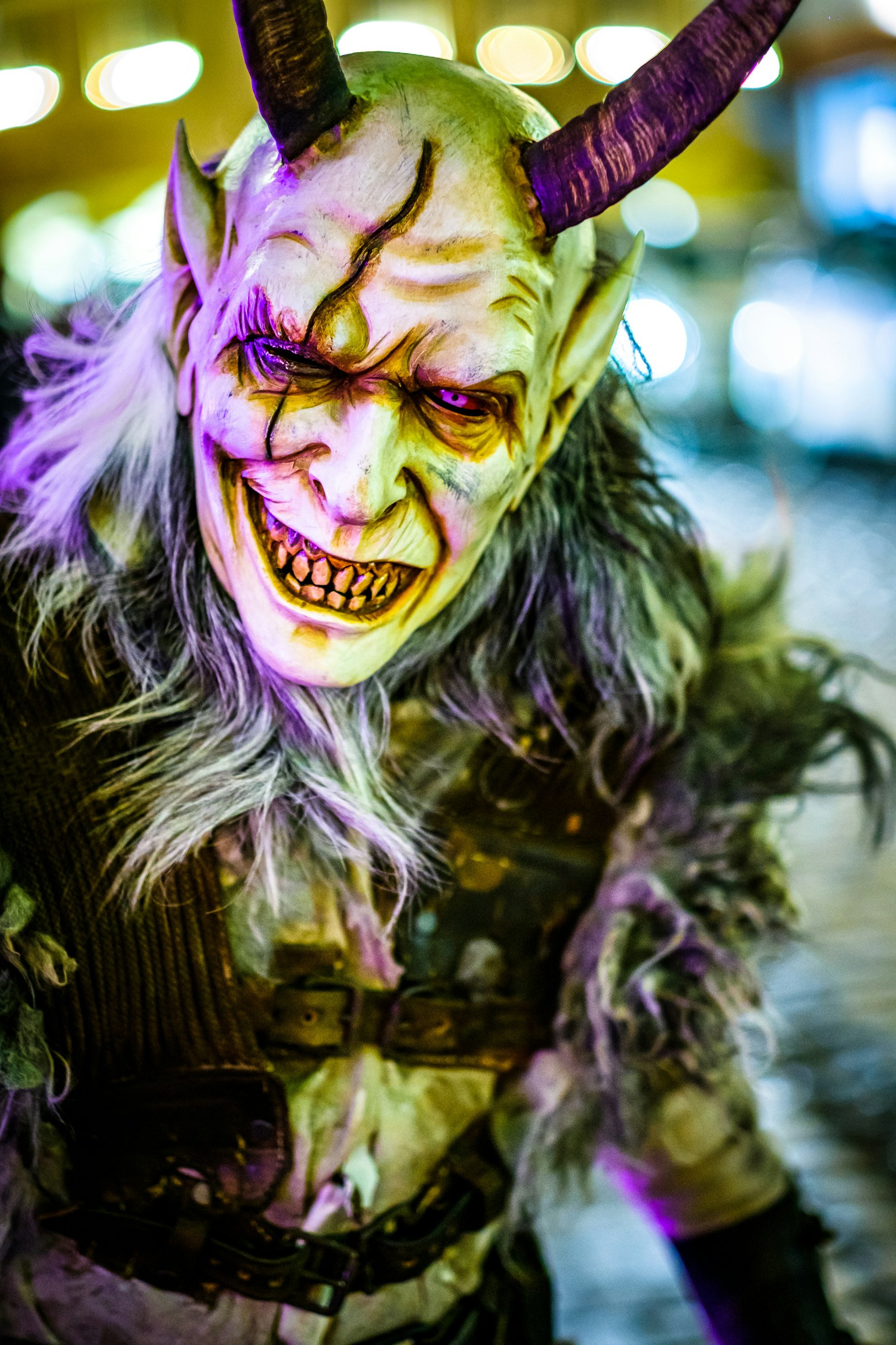 Closeup of a person dressed up in a ghoulish Krampus demon costume