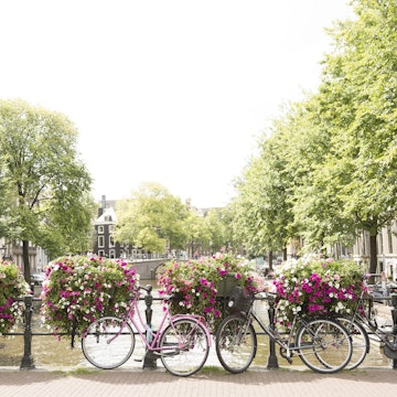 Bicycles on a canal bridge.
