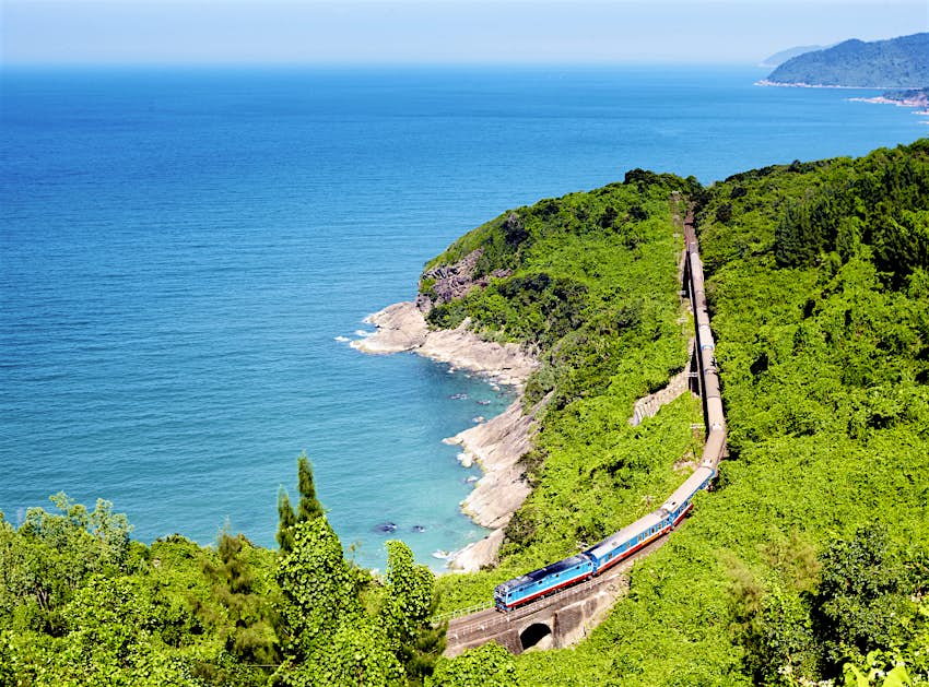 The Reunification Express runs by the South China Sea just north of Hai Van Pass, between Hue and Hoi An – this country-spanning train line took nearly 40 years to complete.
