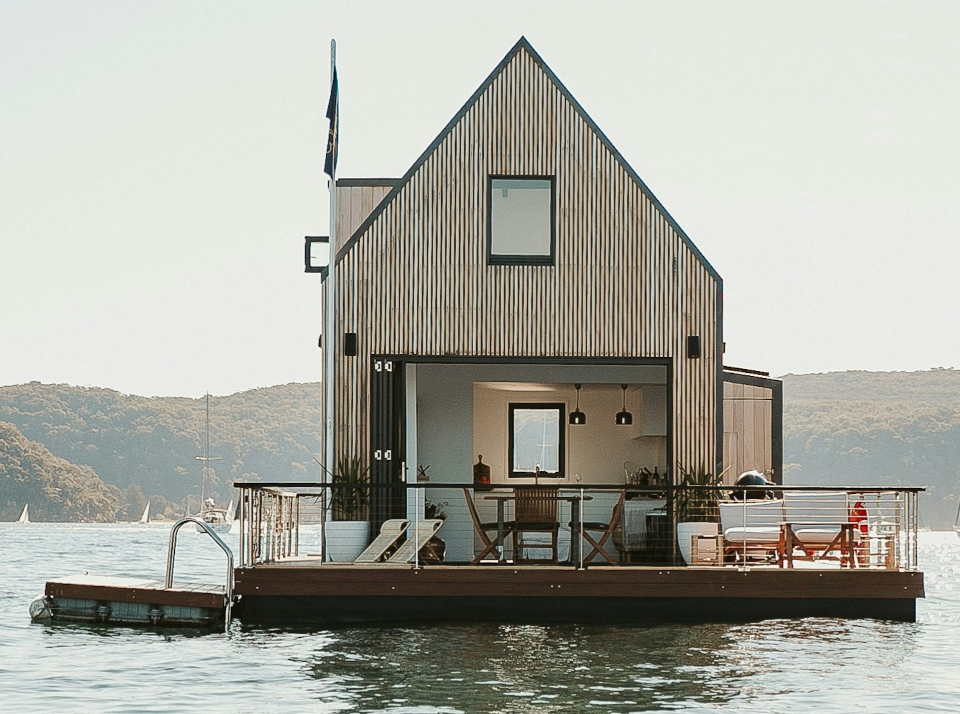 A floating wooden building on a lake