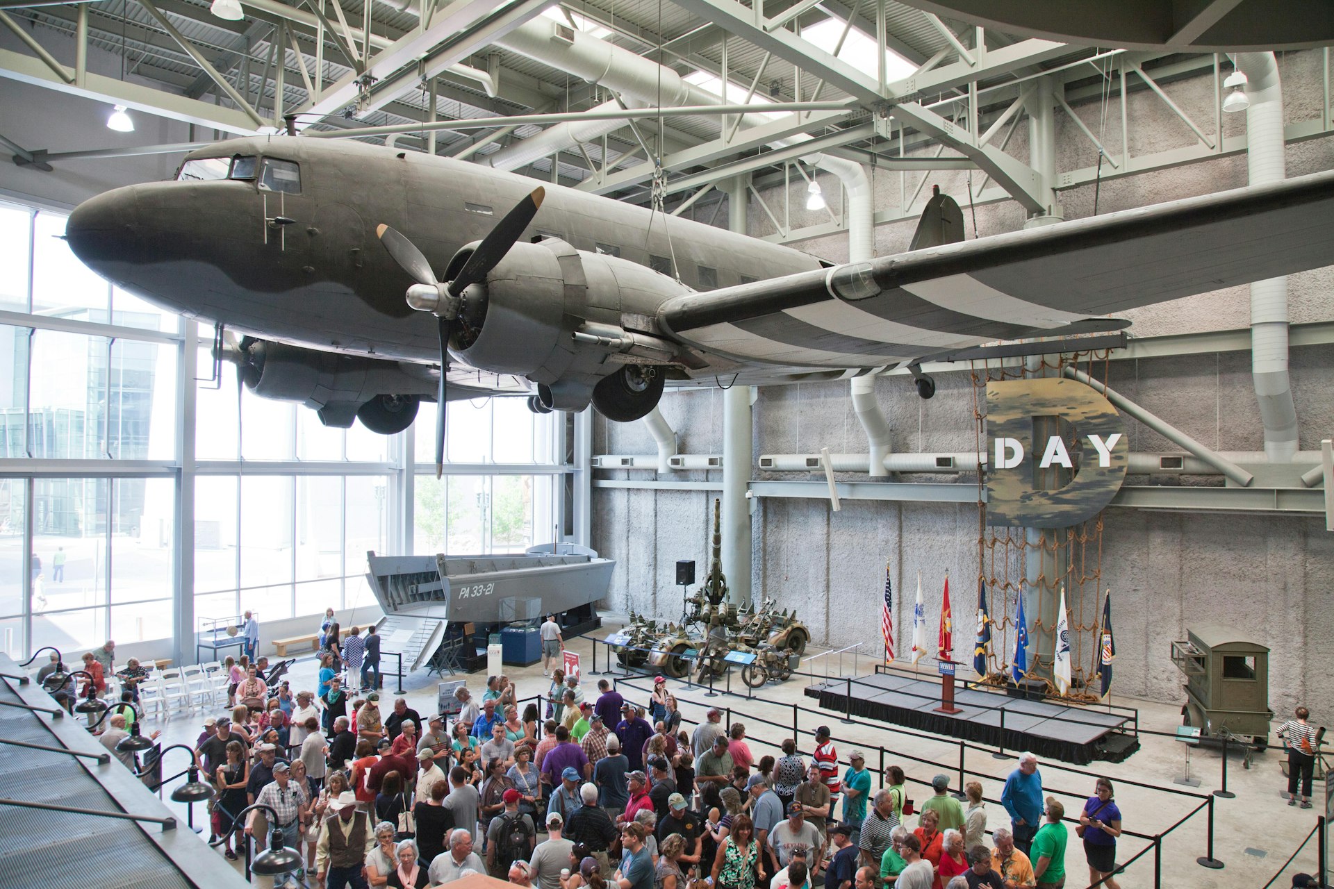 Louisiana Memorial Museum Atrium is the entry area for the The National World War II Museum, New Orleans, Louoisiana. Floor displays include the Higg