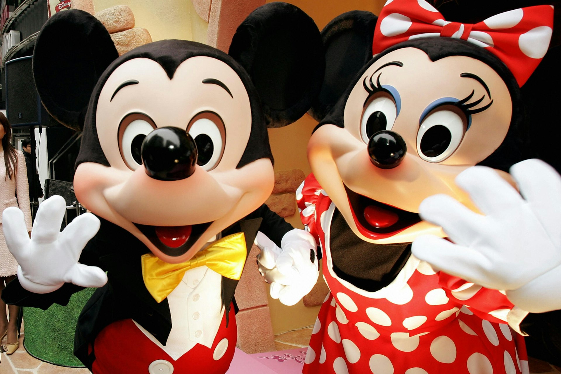 Mickey and Minnie waving at the camera